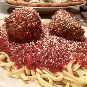 Dontino's Fine Italian Cuisine signature dishes Manicotti, Lasagna, Spaghetti with Meatballs.